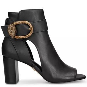 Size 39, never worn, in box and perfect condition.